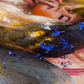 Side view of the angel artwork showcasing the powder oil painting pigment