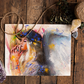 vibrant artwork of an angel praying among the chaos.  