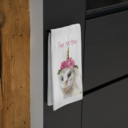 the unicorn tea towel hanging in the kitchen